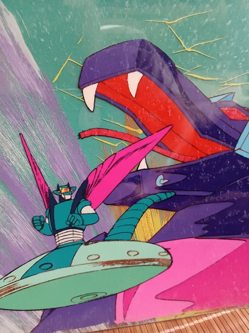 EDOYA background painting with cel animation "UFO Warrior Dai Apolon": Cel Animation Title: UFO Warrior Diapolon Disc Robot produced by Eiken Cel numbers C364A12, B5, D2 in a three-layer overlay Background painting number 788 Dimensions: 193x273mm
