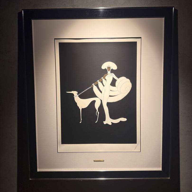 Erte "Ebony and White" 1980s: Erte's Ebony and White Country: France Era: 1980s Material: Silkscreen Print Erte's Ebony and White An elegant silkscreen print created by the master representing the Art Deco style. Depicting a femal