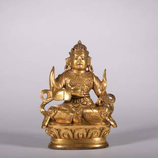 A gilt-bronze statue of Mammon: Height5.1in,length2.8in,width2in,