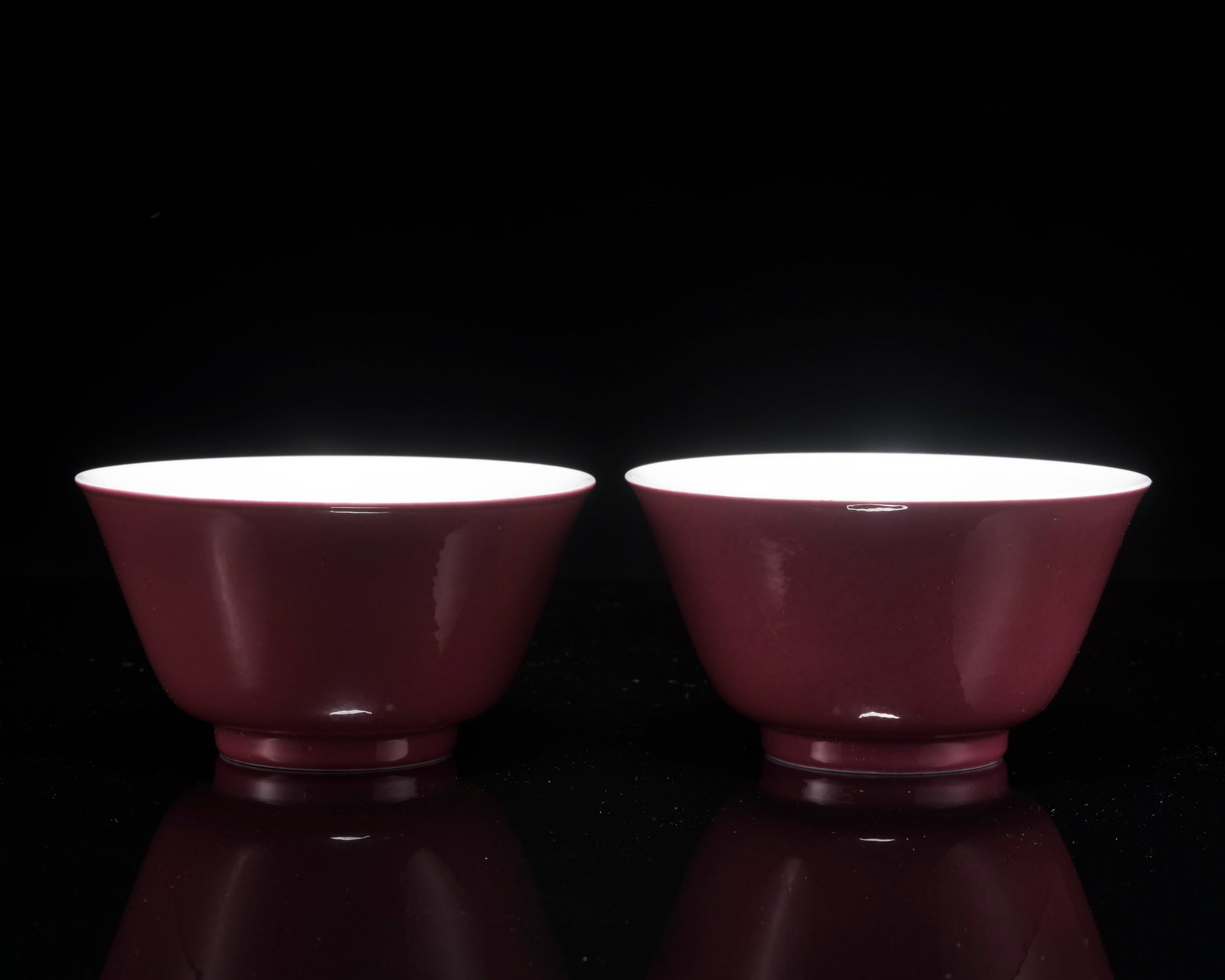 A pair of red glazed famille-rose 'peach' cup: Height1.8in,caliber3.3in,