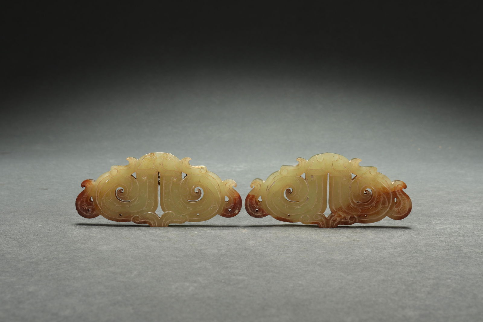 Pair of Han carved jade pendants (1 of 4)