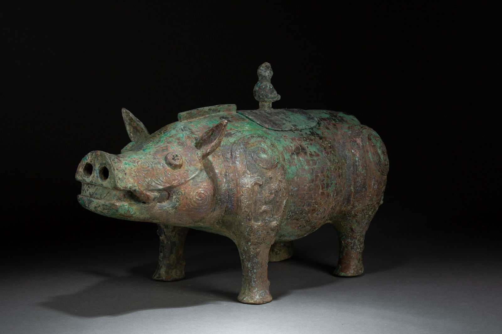 Shang bronze wild-pig food container (1 of 6)