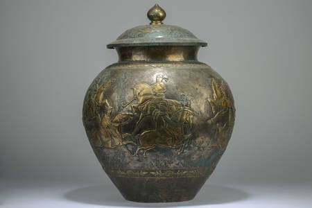 A gilding silver carved jar with a lid, Tang dynasty