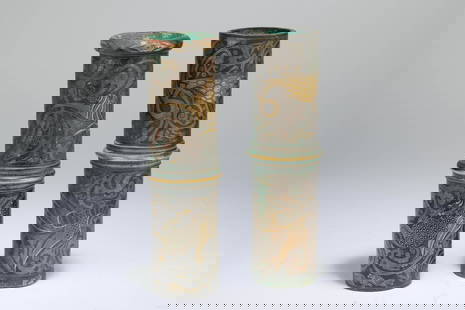 A bronze inlaying with silver and gold divine chariot accessory, Han dynasty: H: 16.5 in. (42 cm) D: 2.3 in. (6 cm)