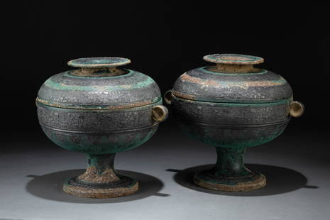 A pair of bronze containers, Spring and Autumn Period: H: 7 in. (18 cm) D: 8.4 in. (21.5 cm)