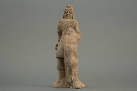 A pterracotta warrior, Tang dynasty: H: 12 in. (30.5 cm)