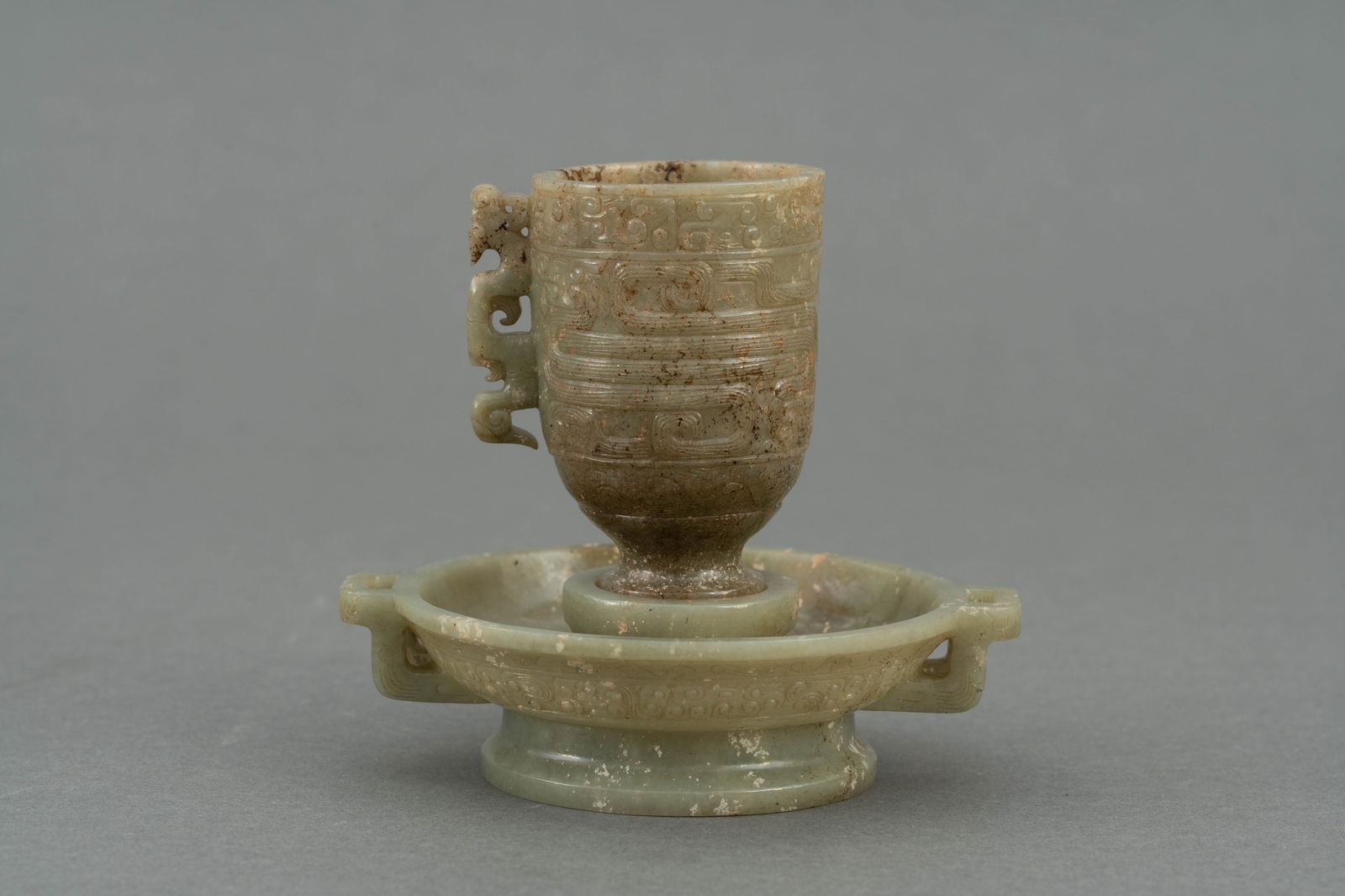 A coiled dragon pattern jade cup, Han dynasty (1 of 6)