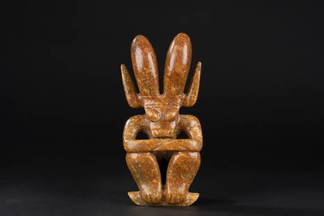 A jade sun god, Hongshan culture period: H: 8.6 in. (22 cm) D: 3.9 in. (10 cm)