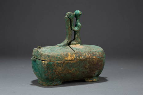 A gliding statue-shaped lamp, Han dynasty: H: 7 in. (18 cm) L: 7.6 in. (19.5 cm)