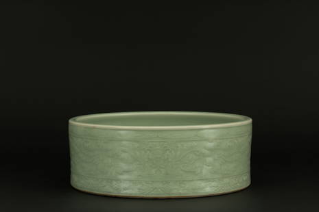 A celadon carved floral pattern brush washer, Ming dynasty, Longquan kiln: H: 4.1 in. (10.5 cm) D: 11.2 in. (28.5 cm)