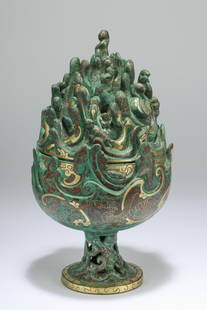 A Boshan furnace inlaying with gold and silver, Han dynasty: H: 9.8 in. (25 cm) D: 5.5 in. (14 cm)
