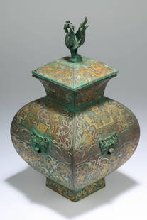 A dragon pattern bronze kettle inlaying with silver and gold, Han dynasty: H: 12.2 in. (31 cm) D: 6.3 in. (16 cm)