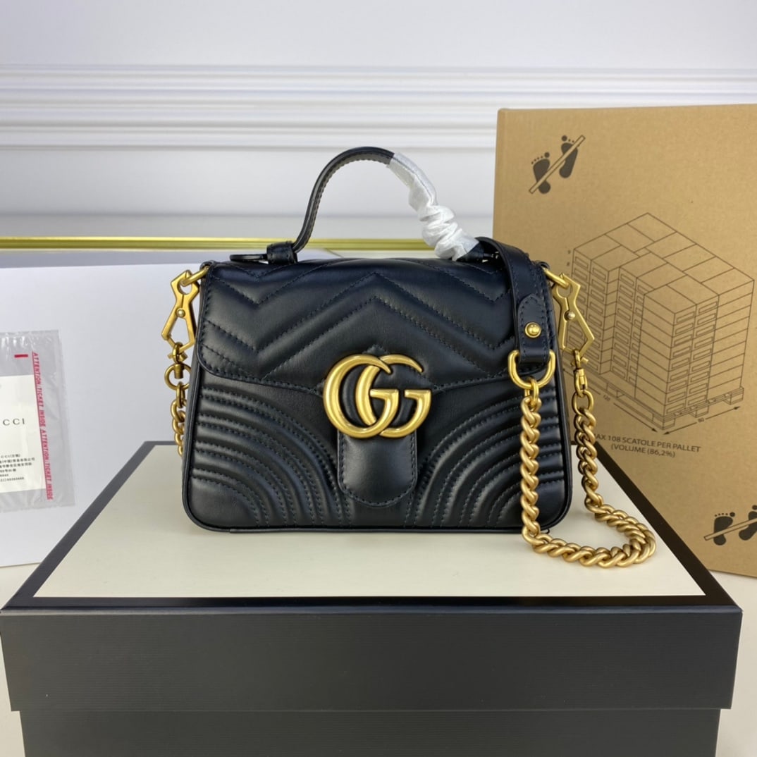 GUCCI MARMONT messenger bag: The GUCCI MARMONT small black messenger bag boasts a simple yet sophisticated design. Its classic and stylish flap with the double G logo makes it one of the most photogenic bags, a timeless classic! 