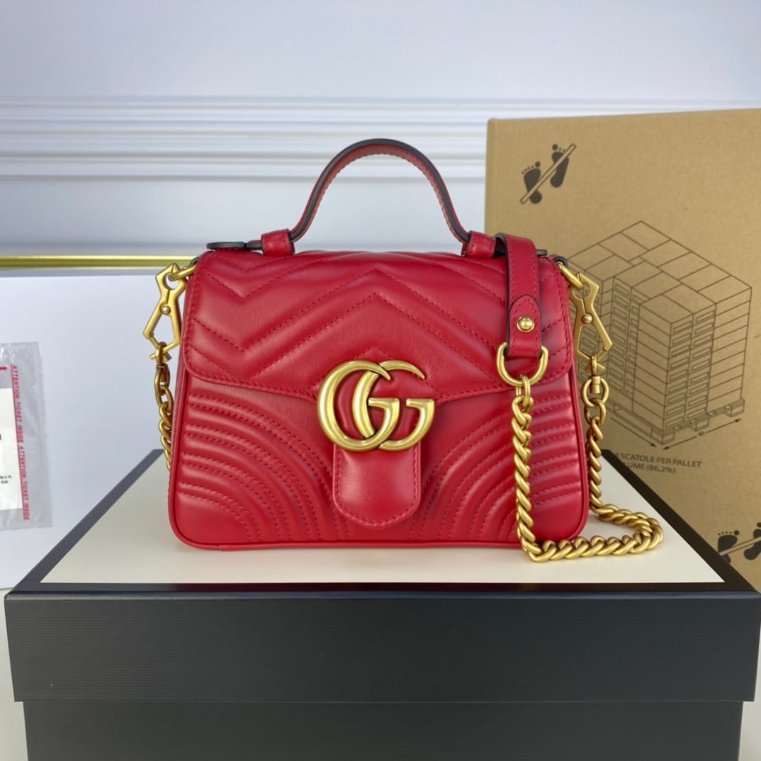 GUCCI MARMONT messenger bag: The GUCCI MARMONT messenger bag, in a small size and bright red, maintains the brand's simple and elegant design. The classic flap with the double G logo makes it one of the most photogenic bags, a ti