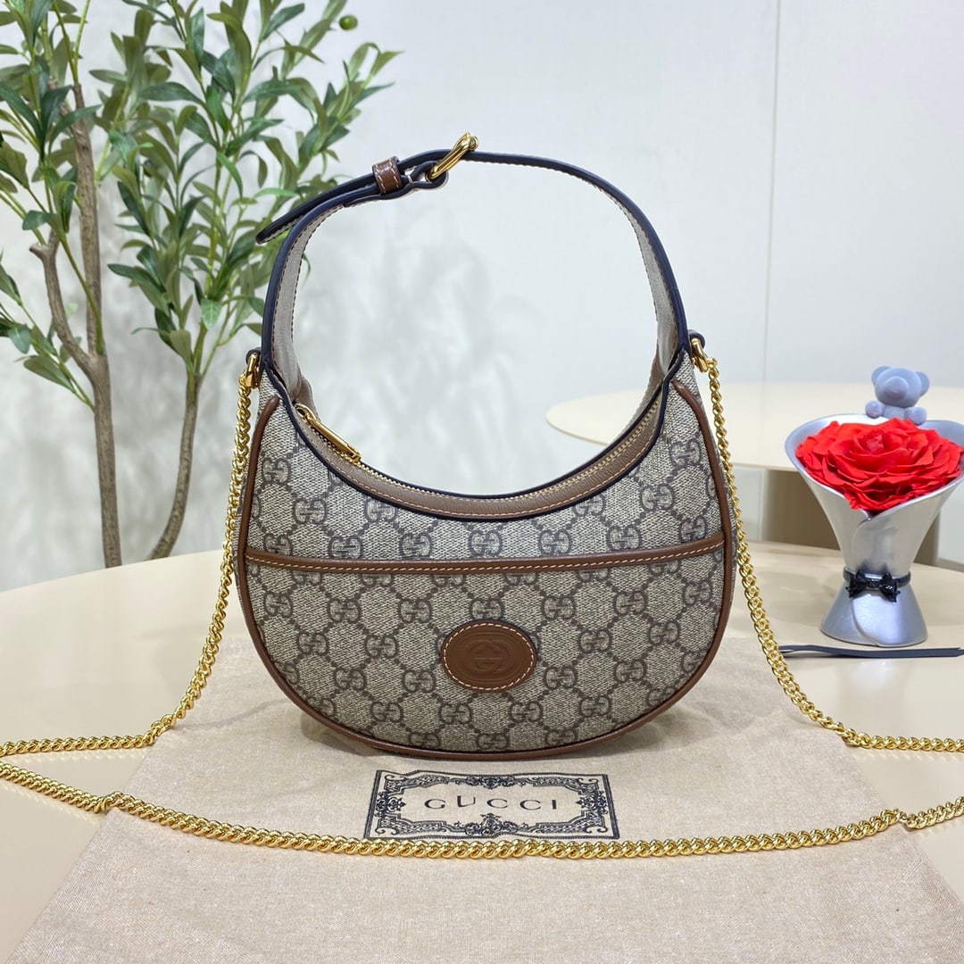 GUCCI crescent-shaped mini handbag: The GUCCI Crescent Moon Mini Handbag features a crescent moon shape and is crafted from GUCCI Supreme canvas, exuding a rich retro style. Each collection from the brand is dedicated to exploring diffe