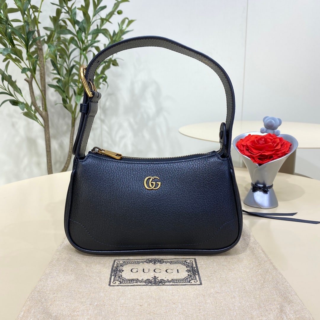 GUCCI Aphrodite: The GUCCI Aphrodite Mini Shoulder Bag in black pays homage to the styles popular in the late 1990s and early 2000s, reinterpreting them with a fresh silhouette. It blends classic design with trendy