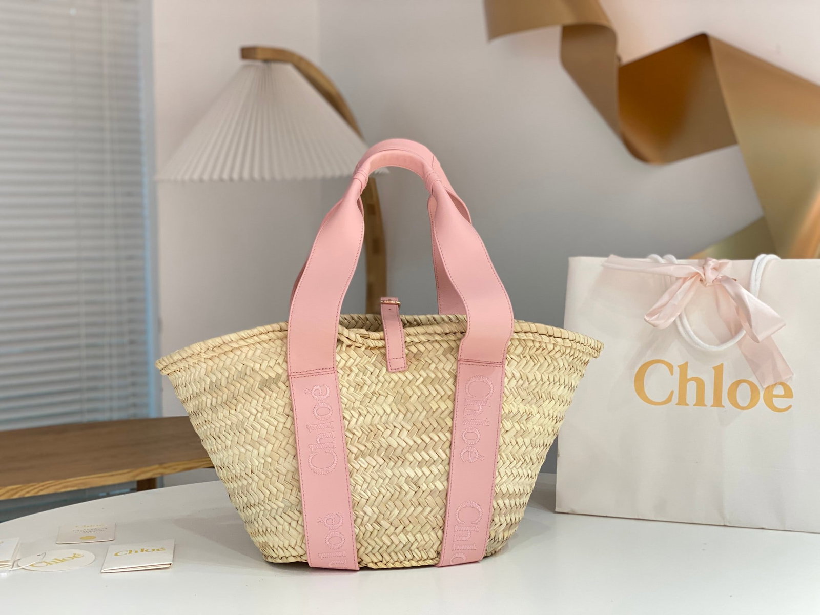 Chloe straw bags: Chloe straw bag. This bag is truly outstanding, with a very versatile color. Each one is made of pure hand-woven raffia and calfskin, offering ample capacity and practicality. Perfect for summer beach