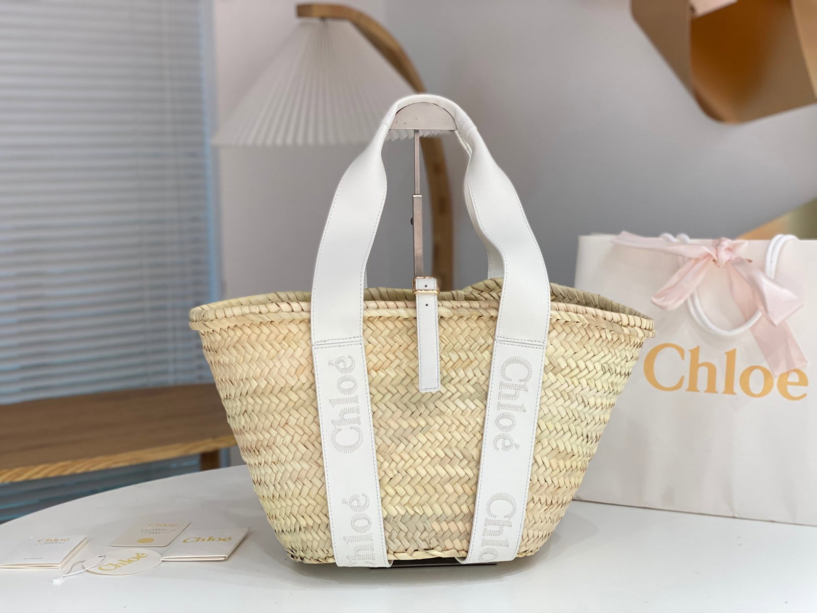 Chloe straw bags: Chloe straw bag. This bag is truly outstanding, with a very versatile color. Each one is made of pure hand-woven raffia and calfskin, offering ample capacity and practicality. Perfect for summer beach