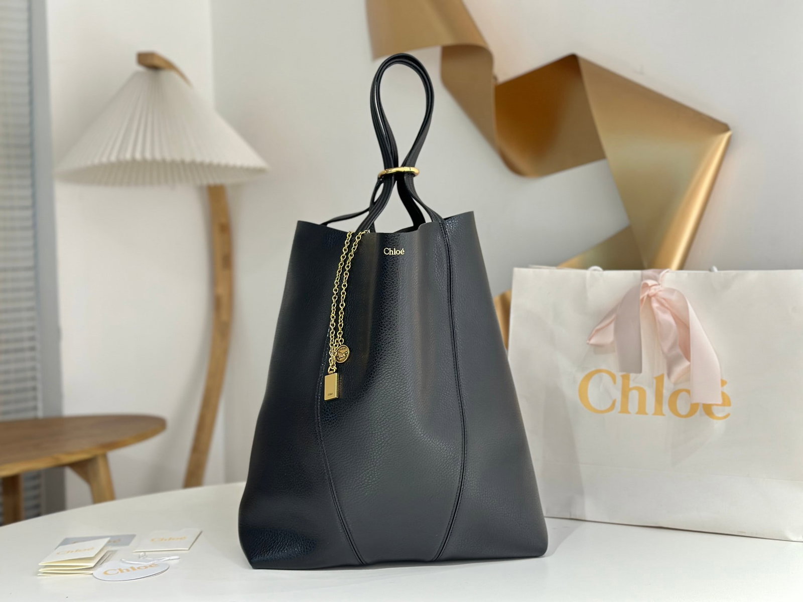 Chloe Spin Bag: The Chloe Spin Bag now I understand why so many celebrities love it! Its exquisite texture, lustrous finish, and feather-light weight, combined with its cleverly designed embellishments, make it easy 