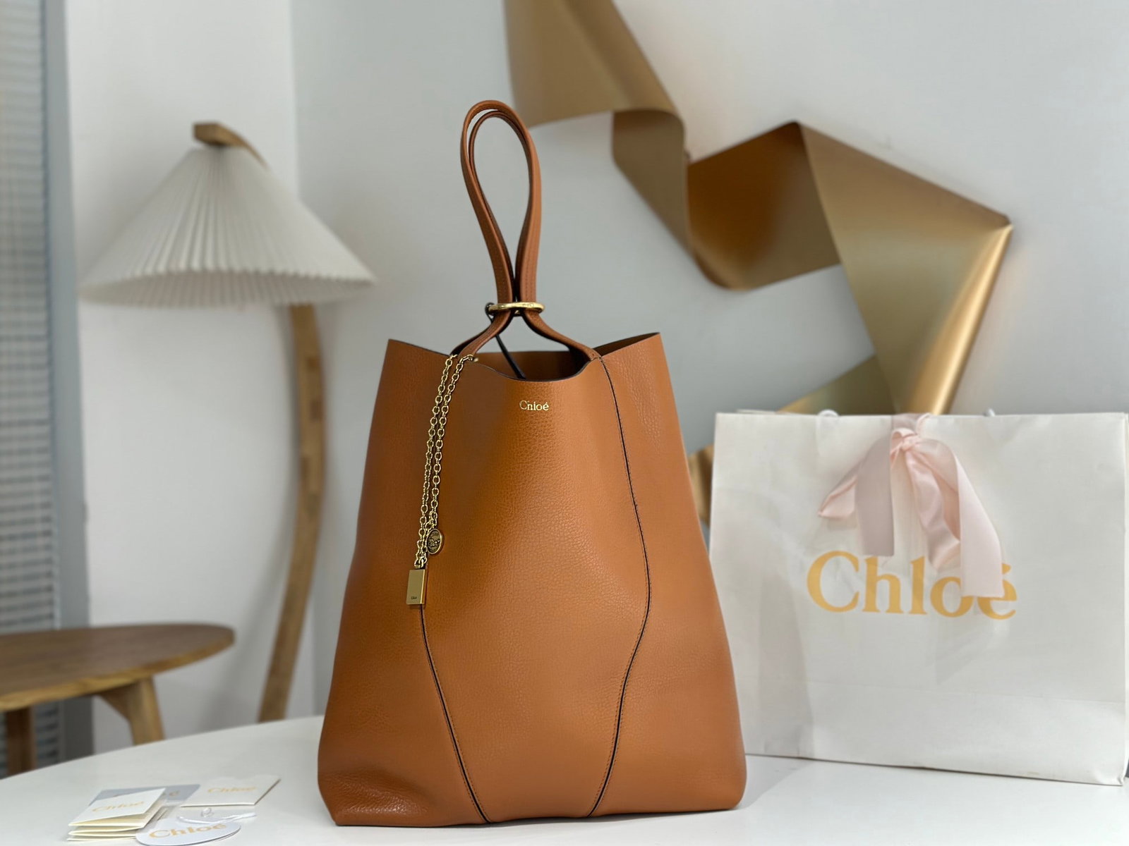 Chloe Spin Bag: The Chloe Spin Bag now I understand why so many celebrities love it! Its exquisite texture, lustrous finish, and feather-light weight, combined with its cleverly designed embellishments, make it easy 