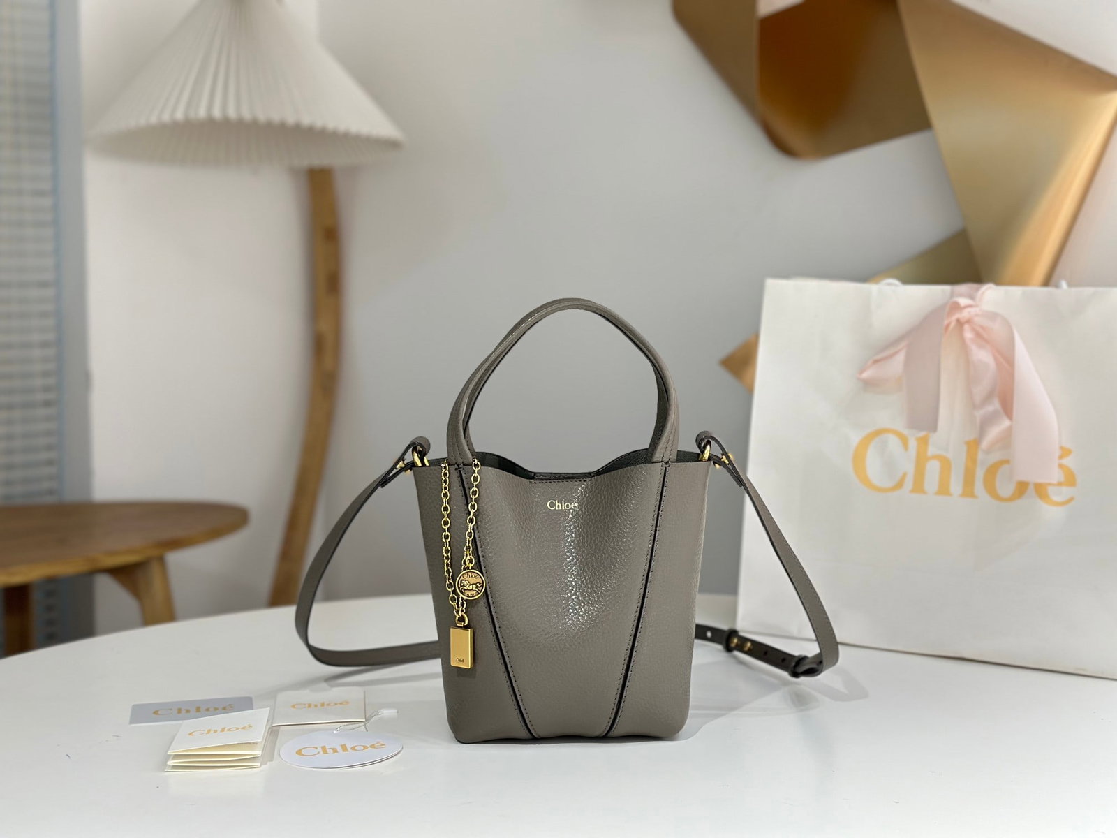 Chloe Spin Bag: The Chloe Spin Bag now I understand why so many celebrities love it! Its exquisite texture, lustrous finish, and feather-light weight, combined with its cleverly designed embellishments, make it easy 