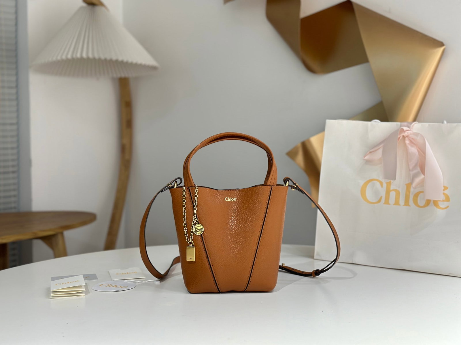 Chloe Spin Bag: The Chloe Spin Bag now I understand why so many celebrities love it! Its exquisite texture, lustrous finish, and feather-light weight, combined with its cleverly designed embellishments, make it easy 