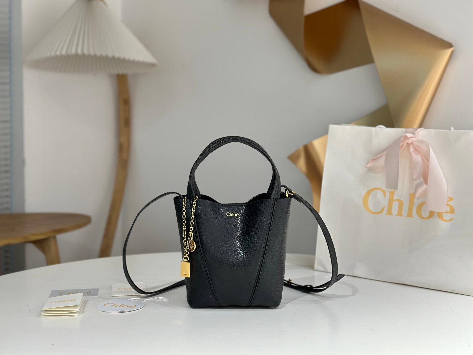 Chloe Spin Bag: The Chloe Spin Bag now I understand why so many celebrities love it! Its exquisite texture, lustrous finish, and feather-light weight, combined with its cleverly designed embellishments, make it easy 