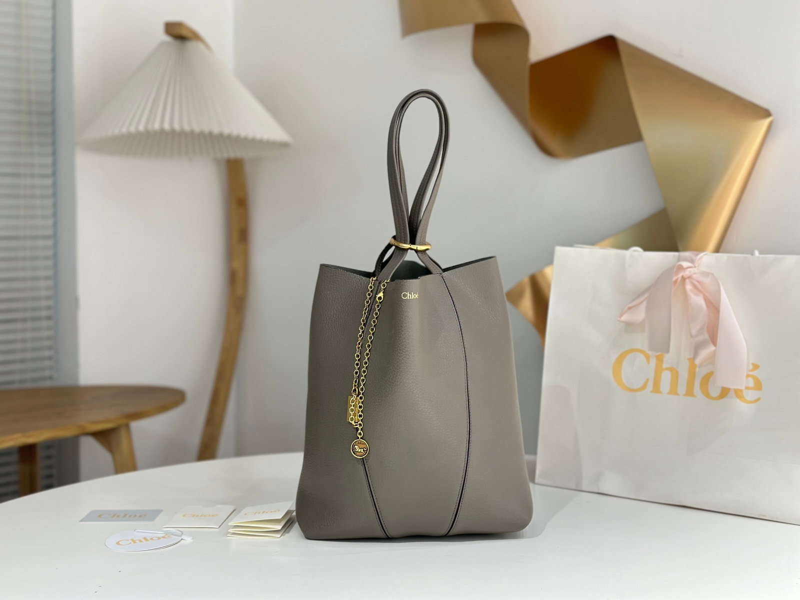 Chloe Spin Bag: The Chloe Spin Bag now I understand why so many celebrities love it! Its exquisite texture, lustrous finish, and feather-light weight, combined with its cleverly designed embellishments, make it easy 
