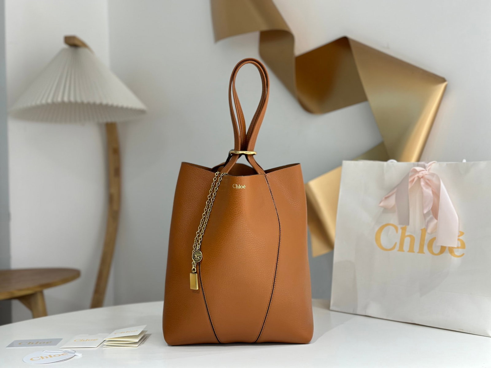 Chloe Spin Bag: The Chloe Spin Bag now I understand why so many celebrities love it! Its exquisite texture, lustrous finish, and feather-light weight, combined with its cleverly designed embellishments, make it easy 
