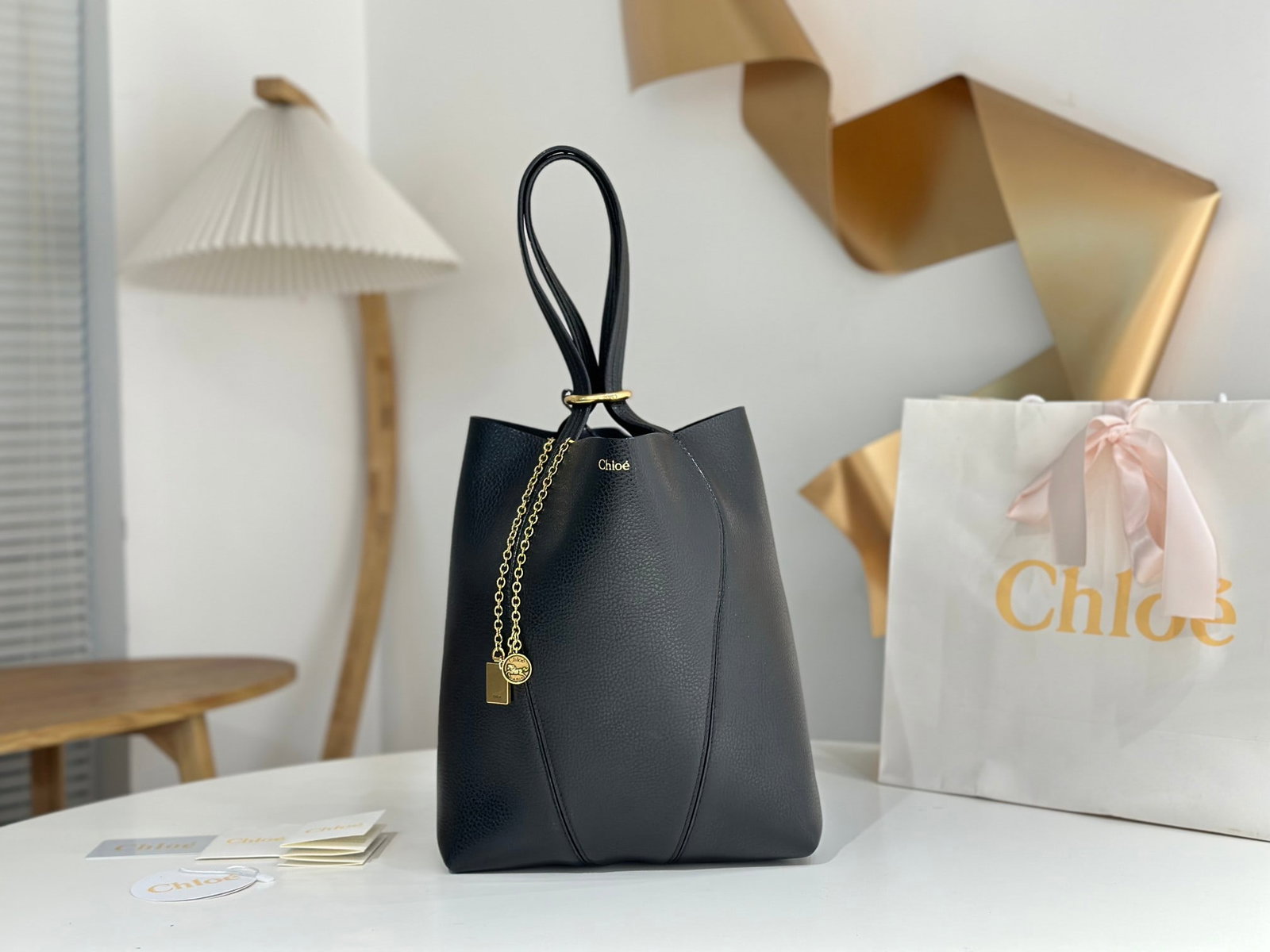 Chloe Spin Bag: The Chloe Spin Bag now I understand why so many celebrities love it! Its exquisite texture, lustrous finish, and feather-light weight, combined with its cleverly designed embellishments, make it easy 