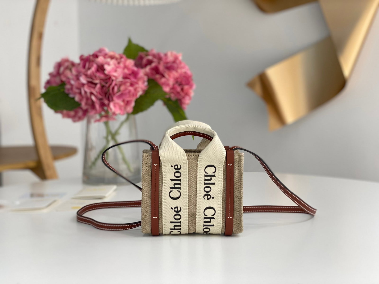Chloe Woody nano: The Chloe Woody Nano, the smallest bag in the family, is a super mini bag loved by fashionistas. While it may not be as practical as some of the larger Nano models, its cute and compact size has won t