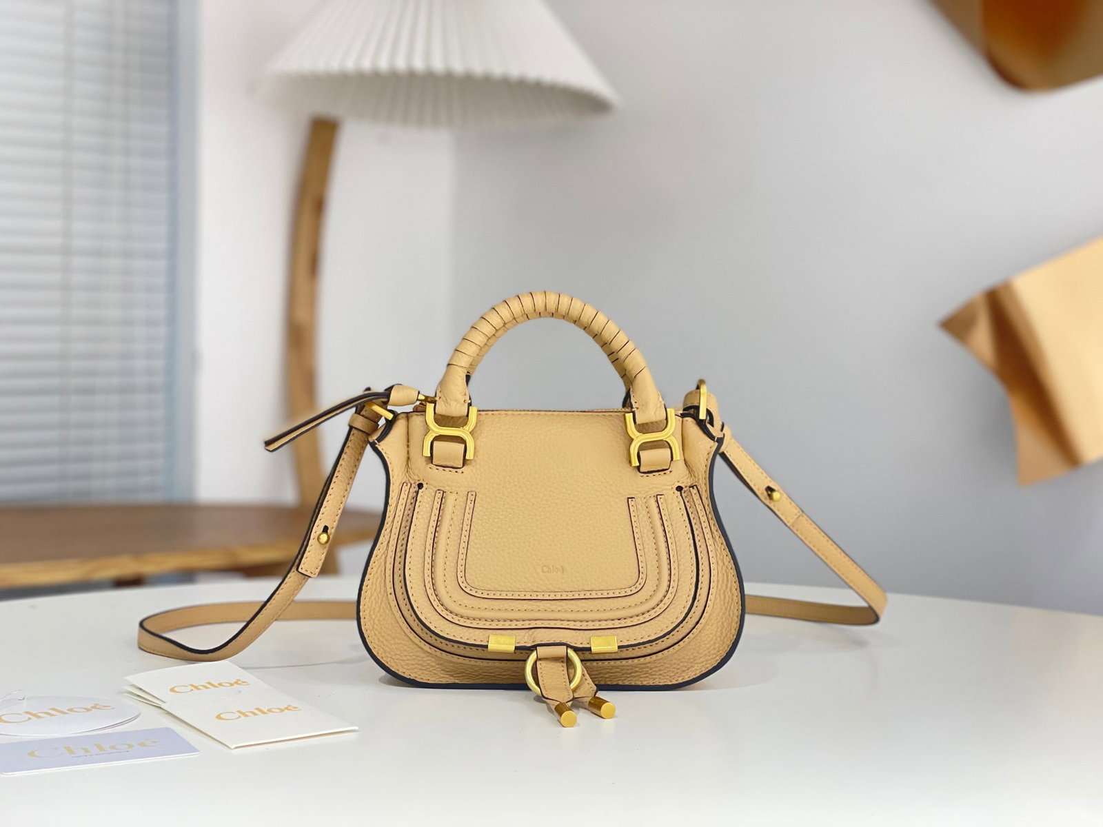 Chloe x Marcie: The Chloe x Marcie milk tea color bag is a classic and trendy design. It's a very practical bag with ample capacity, perfect for working women. It can easily hold a laptop, documents, iPad, daily make