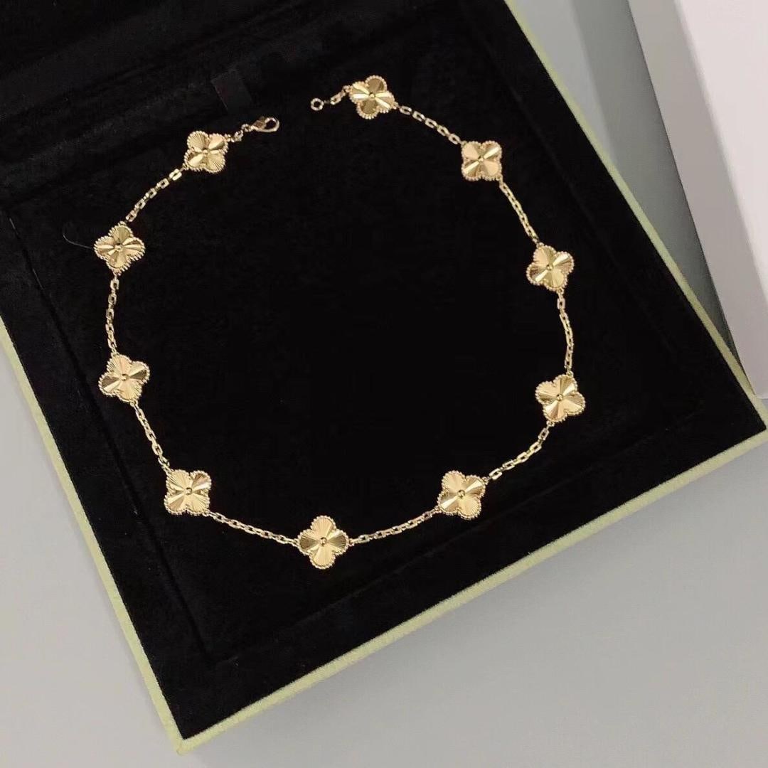 VCA four-leaf clover laser engraving 10 floral necklace: Vca four leaf clover laser 10 flower carved necklace Wonderful gift for you or your loved one.We offer consoilidated shipment for all goods to our domestic and international customers at affordable pr