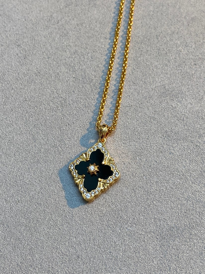 Buccellati Black Onyx Necklace with Diamonds and Single Flower Design (1 of 7)