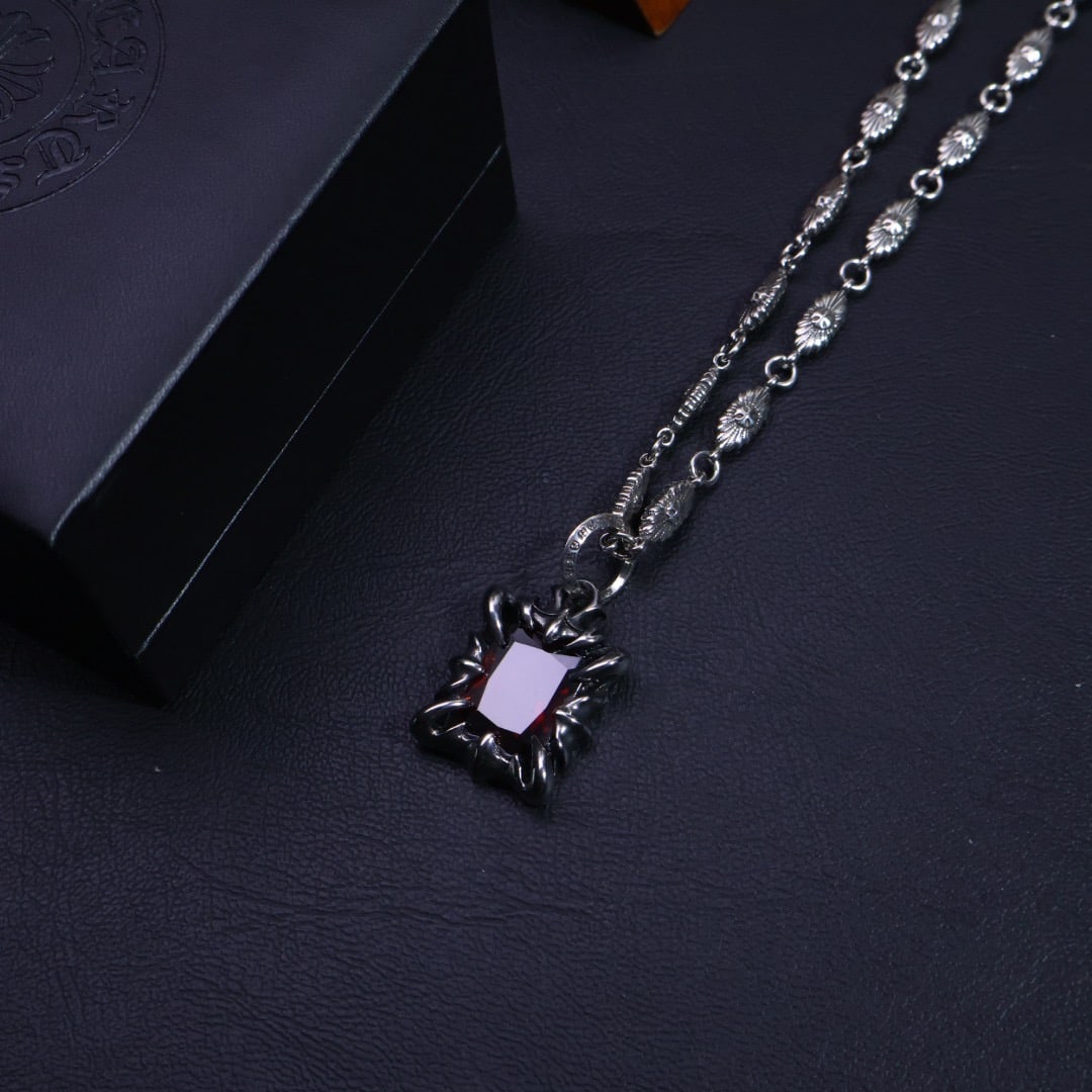Chrome Hearts necklace: Chrome Hearts necklaces, with their unique designs and patterns, present a distinctive look. The cross and scout flower are the hallmarks of Chrome Hearts, making them timeless. Authentic Chrome Heart