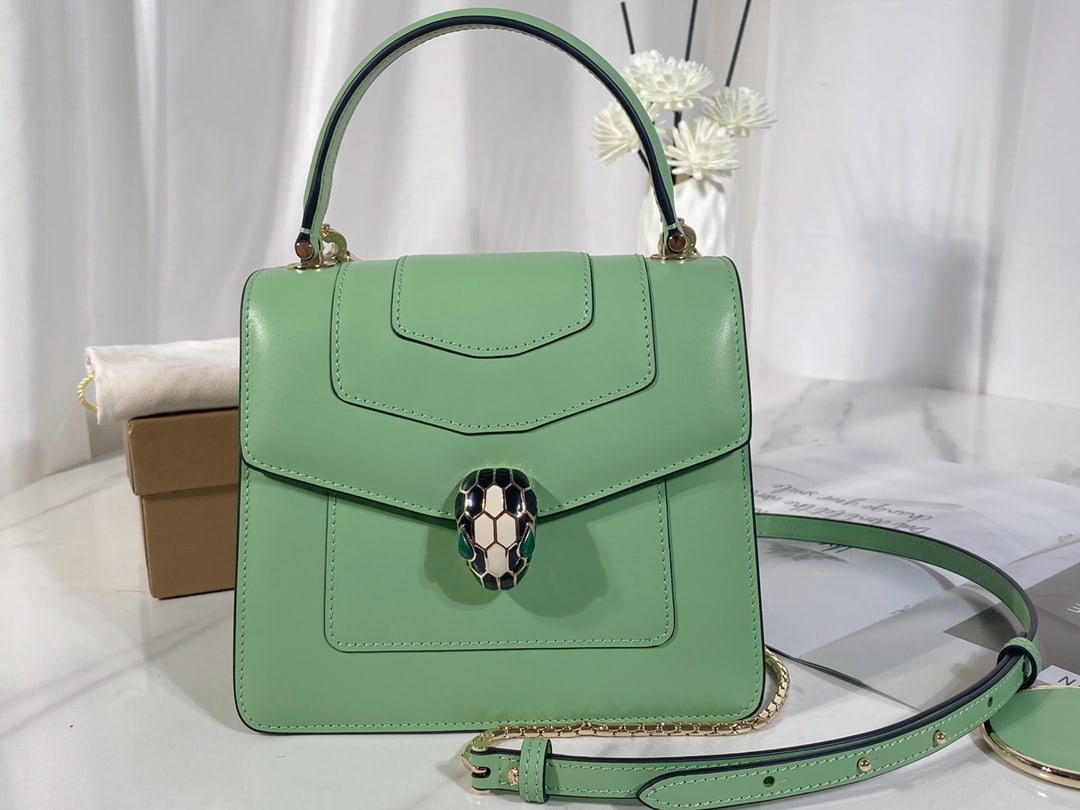 Bvlgari Serpenti Forever: The Serpenti Forever crossbody bag is stylish and versatile. This bag is crafted from mint calfskin with black and white agate enamel and green malachite sensual eyes. The adjustable snake chain and l