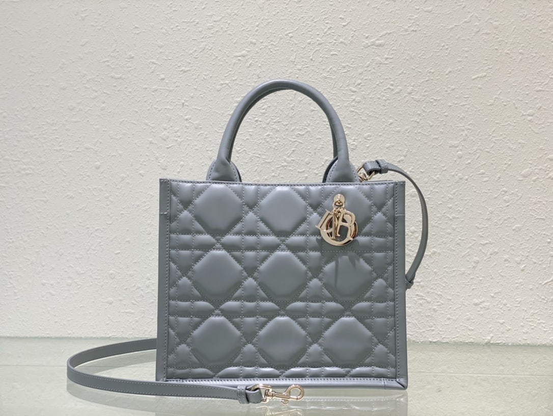 Dior tote: The Dior tote (shoulder strap) made a stunning debut at the Dior Fall Winter 2023 ready-to-wear collection, showcasing a modern and elegant practical design. Crafted from grey calfskin leather and ado