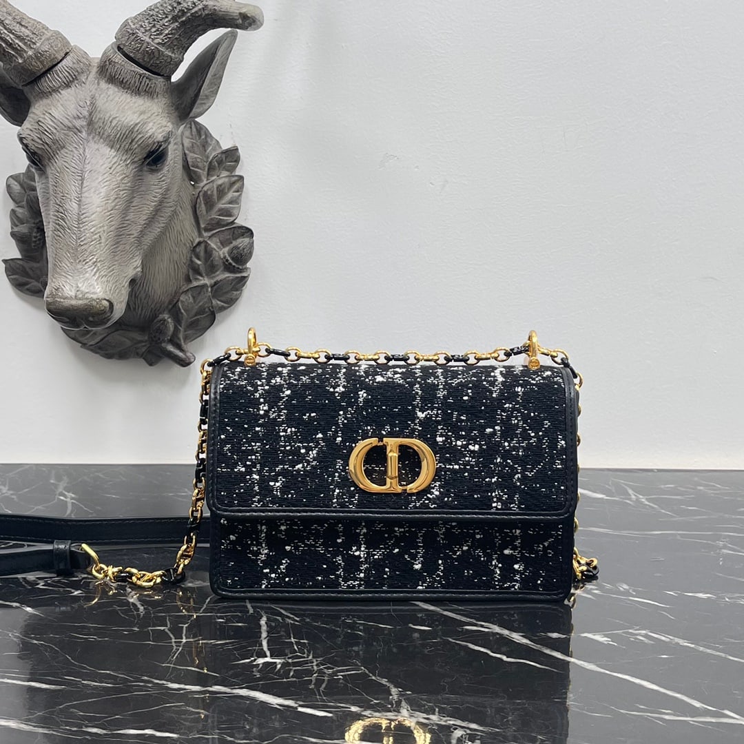 Dior Miss Caro: The Dior Miss Caro mini handbag, part of the 2023 collection, enriches the Dior Caro line and exudes a stylish and elegant flair. Crafted from black tweed-effect fabric, it features a cannage pattern 
