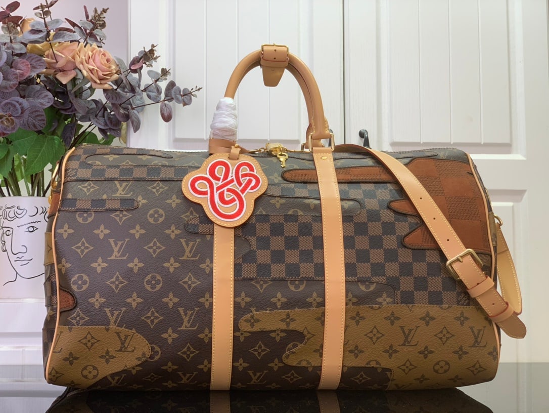 LV Keepall BandouliEre 50: The Keepall BandouliEre 50 travel bag incorporates Monogram Reverse and Damier canvas appliques into its Monogram canvas, creating a striking visual effect perfect for weekend getaways. Distressed cal