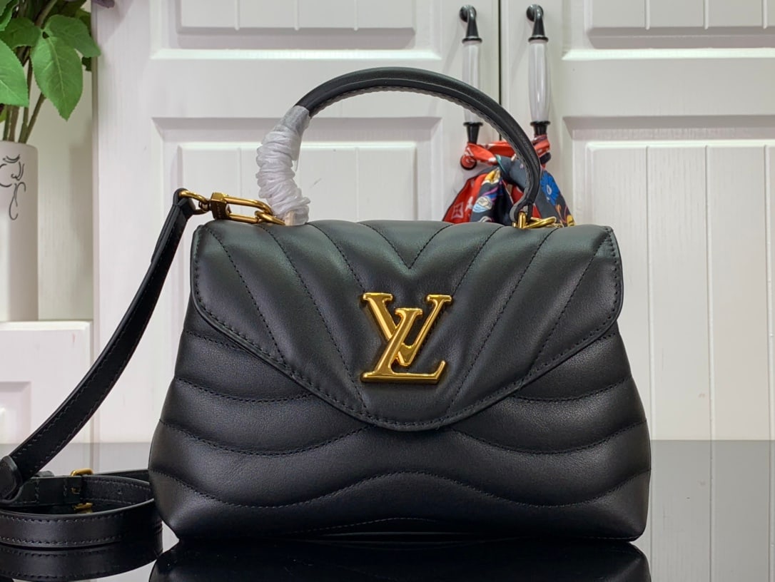LV HOLD ME: The Hold Me handbag is a new addition to LV's iconic New Wave quilted leather goods collection. It boasts an exquisite design and comfortable carrying. The smooth-to-the-touch body is adorned with an 