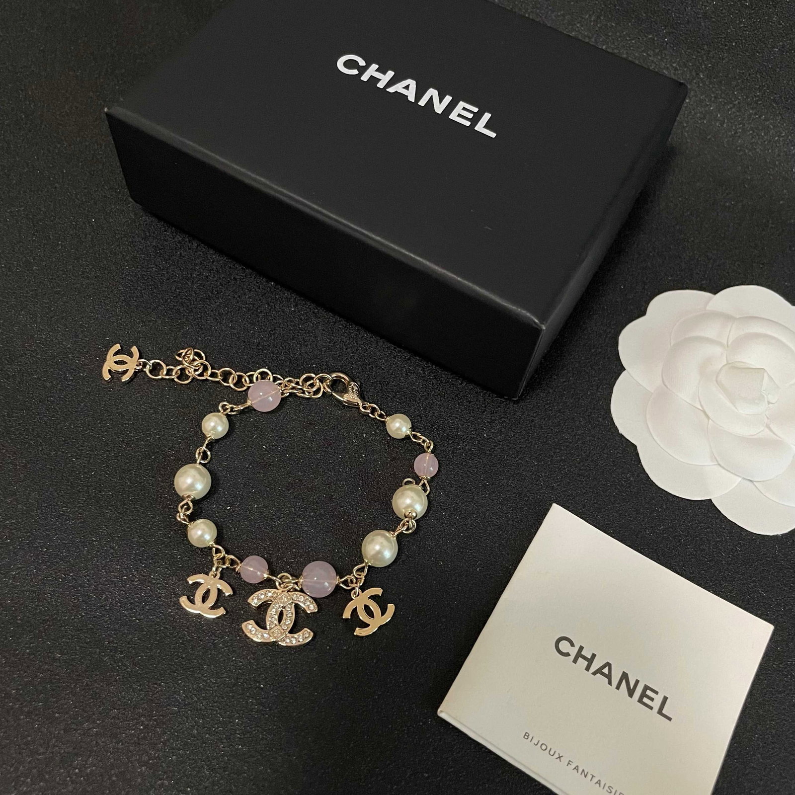 Chanel vintage letter bracelet: This Chanel vintage letter bracelet is exquisite and elegant, exuding sophistication. A wonderful gift for you or your loved one. We offer consoiled shipping for all goods to our domestic and internat