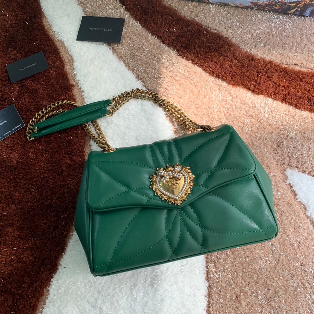 Dolce & Gabbana: Dolce & Gabbana quilted leather crossbody bag from the collection. Features a front flap design adorned with a handcrafted logo heart, jewel-like metal hardware, pearl embellishments, a concealed snap