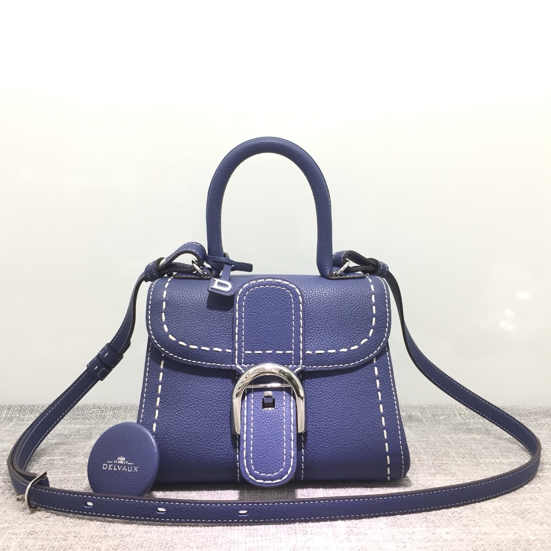 Delvaux brillant: Delvaux brillant brillant togo leather, hand-stitched with waxed thread. Its intricate craftsmanship and robust hand-stitching are the result of ten years of artisan work. Comes with an adjustable sho