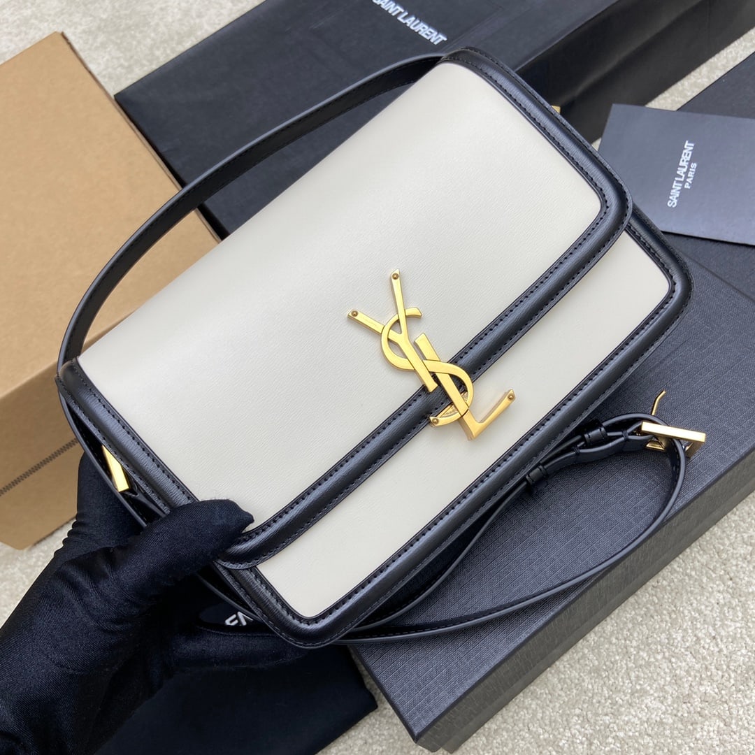 Yves Saint laurent Yves Saint laurent MONOGRAM: Black and white toothpick pattern, antique gold and black and white Yves Saint Laurent MONOGRAM. Adjustable crossbody or shoulder strap. One main compartment with card slots, one foldable flat pocket,