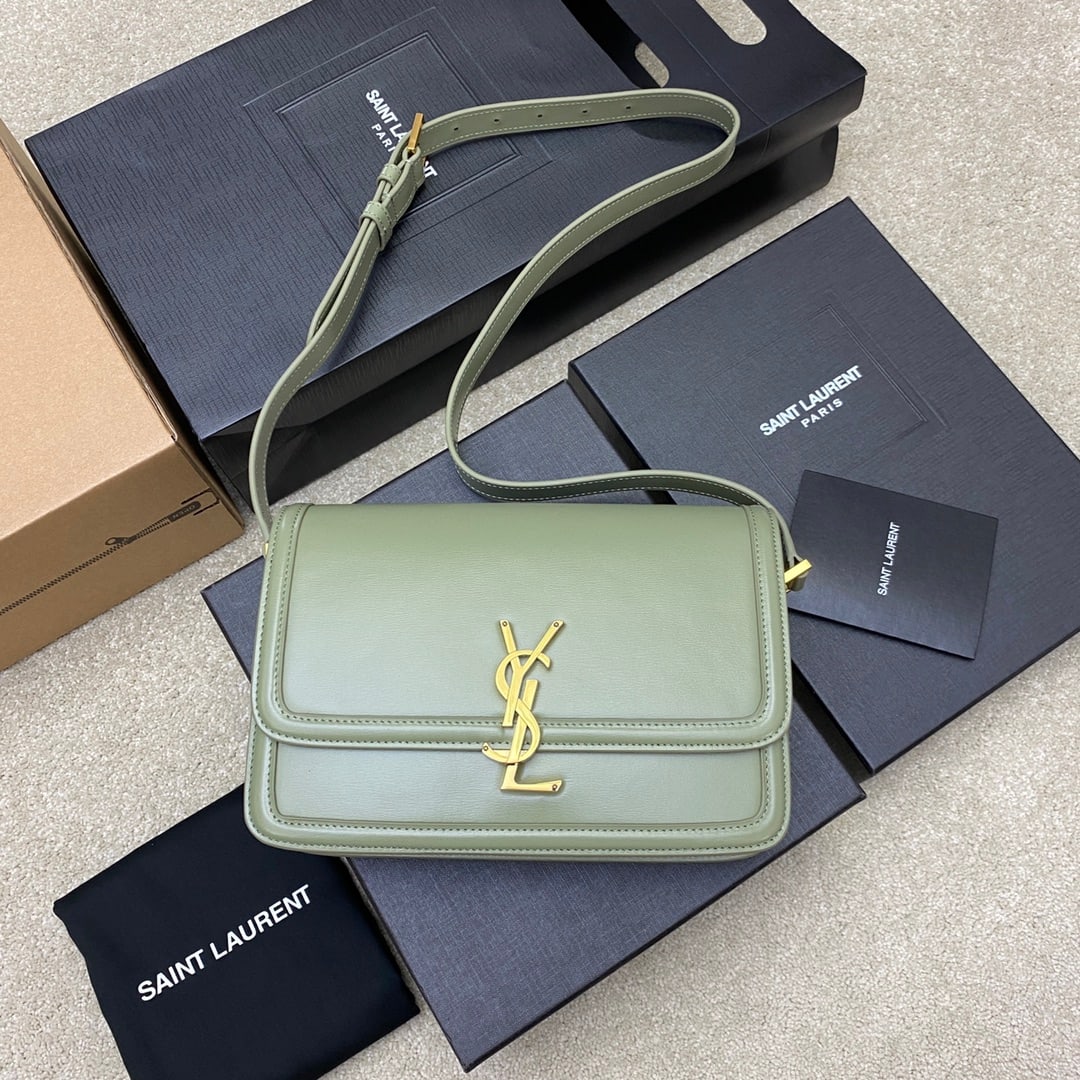 Yves Saint laurent Yves Saint laurent MONOGRAM: This classic avocado green Yves Saint Laurent MONOGRAM toothpick-patterned gold bag features an adjustable crossbody or shoulder strap, a main compartment with card slots, a foldable flat pocket, and 