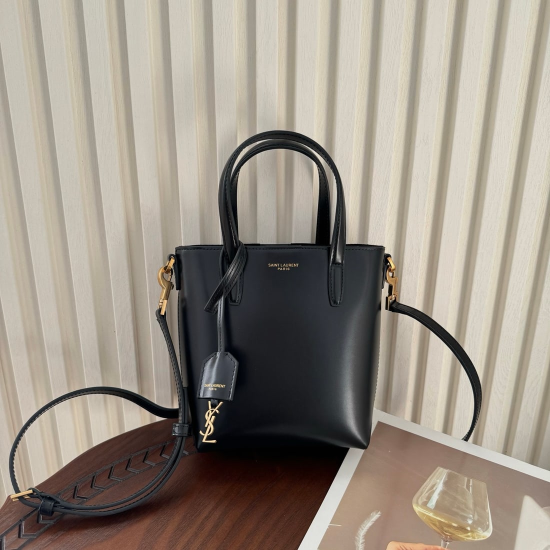 Yves Saint Laurent Mini Tote Bag: Mini tote bag, small and exquisite. Made of smooth calfskin, with a simple and understated design. Can be carried by hand or worn crossbody, easily handling everyday occasions. Size: 18 x 17 x 8 cm! A