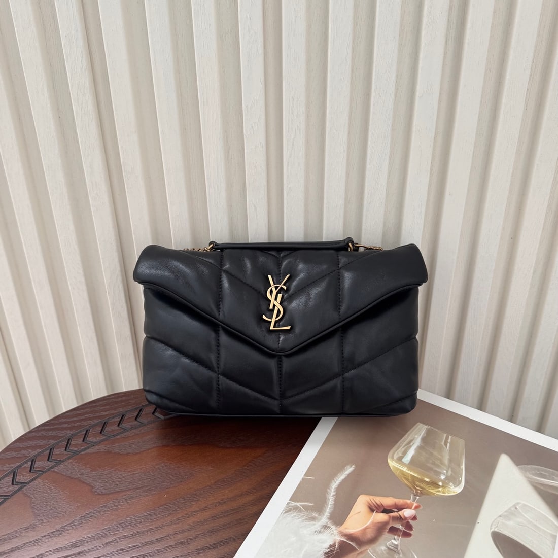 Yves Saint Laurent Louis Puffer Mini Double Chain Terms: LOULOU PUFFER Mini Double Chain Bag! Made with soft, supple lambskin, grosgrain lining, V-quilting, and a sliding chain shoulder strap, it can be worn over the shoulder, as a hobo bag, carried by hand
