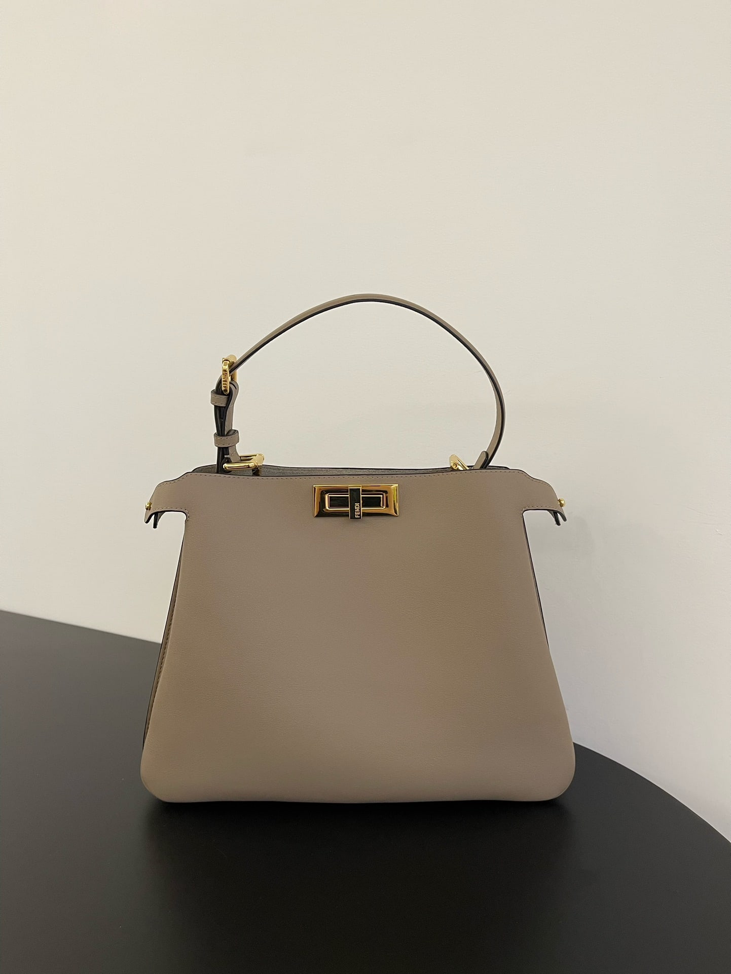 Fendi Peekaboo Soft: Peekaboo Soft, crafted from supple calfskin, features a classic double-sided turn lock for a simple yet sophisticated look. Both side compartments can be opened, offering ample capacity and a stylish 