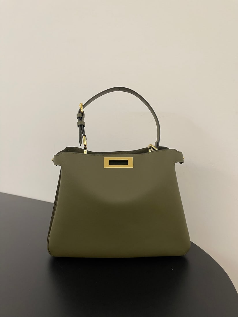 Fendi Peekaboo Soft: Peekaboo Soft, crafted from supple calfskin, features a classic double-sided turn lock for a simple yet sophisticated look. Both side compartments can be opened, offering ample capacity and a stylish 