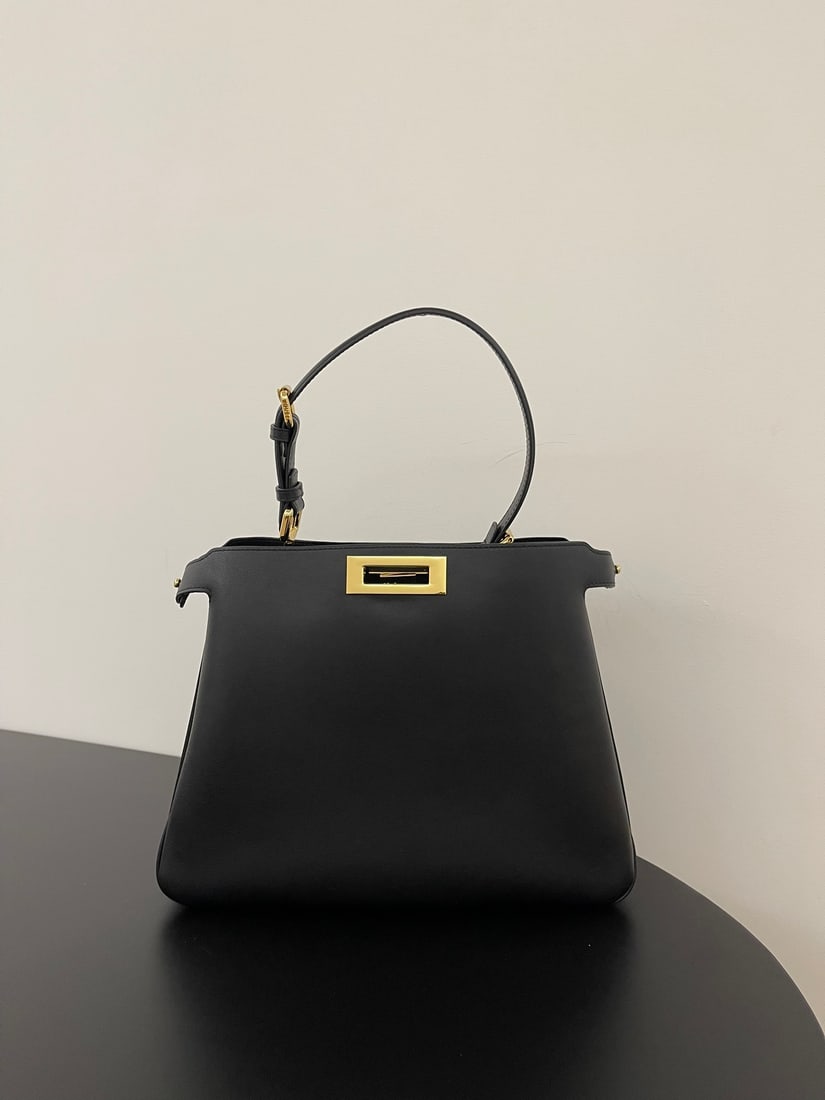 Fendi Peekaboo Soft: Peekaboo Soft, crafted from supple calfskin, features a classic double-sided turn lock for a simple yet sophisticated look. Both side compartments can be opened, offering ample capacity and a stylish 